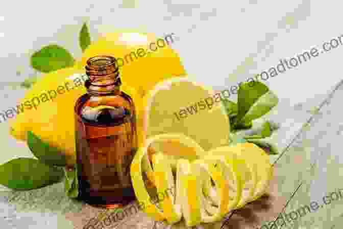 A Cut Lemon With Its Essential Oil Essential Oils: With The 12 Fundamental Essential Oils (natural Remedies Essential Oils For Beginners Aromatherapy Essential Oils Essential Oils Guide)