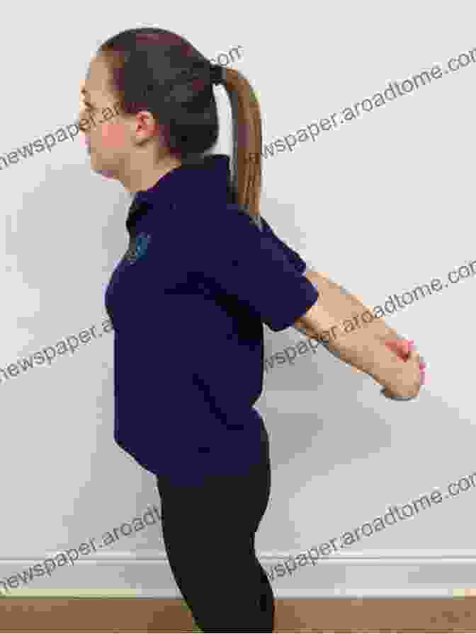 A Person Performing A Biceps Stretch Get Stronger By Stretching #2: Upper Body / Warm Up