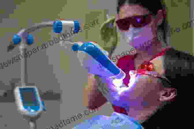 Dentist Using A Laser For Dental Treatment Lasers In Dentistry Practical Text