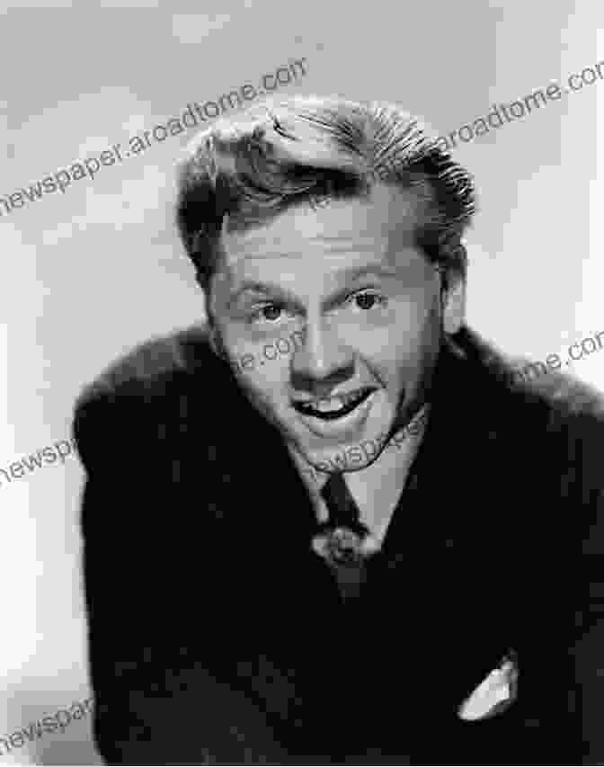 Photo Of Mickey Rooney As An Adult Actor, Wearing A Suit And Tie, Smiling The Life And Times Of Mickey Rooney